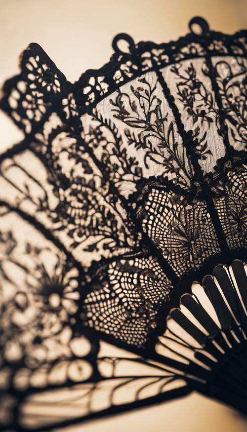 Close-up of an antique black lace hand fan Tapet [92eeef3c249b4f6aa569]