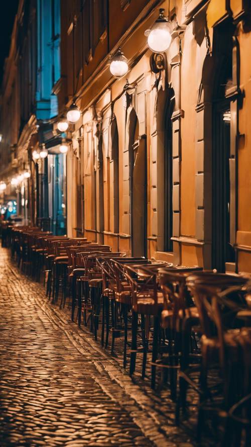Pemandangan malam di pusat kota St. Petersburg, dengan bar dan restoran yang ramai, serta tepi laut yang diterangi lampu kota.