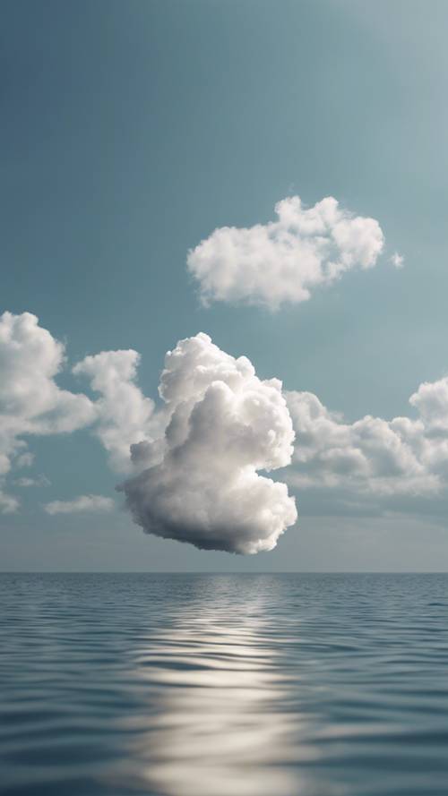 Awan putih yang sepi melayang di atas laut yang tenang.