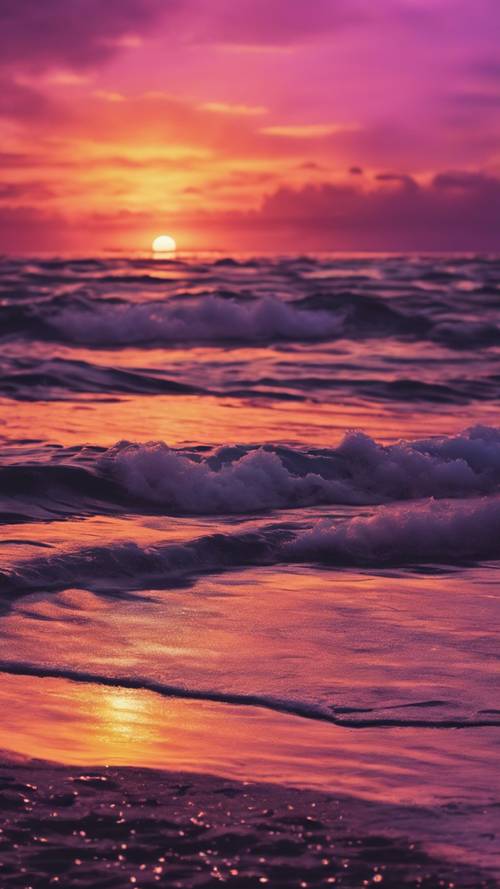 고요한 바다 위로 선명한 보라색과 주황색의 일몰이 펼쳐집니다.