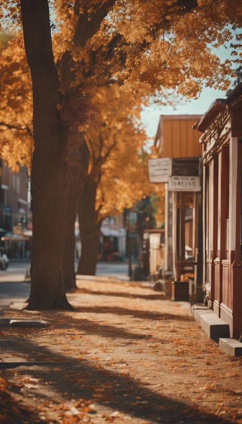 秋の色が映える西部の町の壁紙