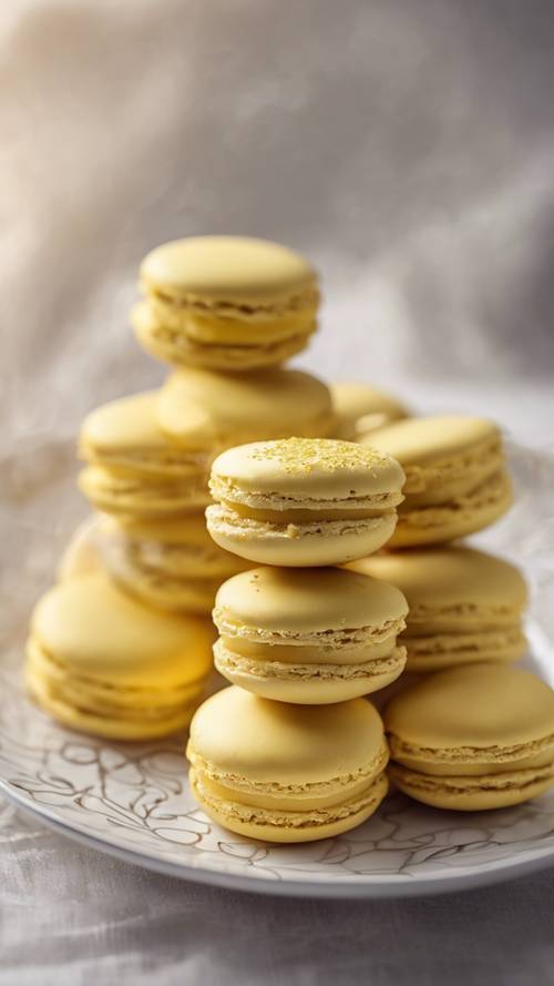 Yellow macaroons delicately lined on an elegant porcelain plate.