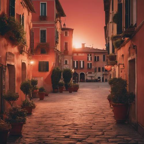 An Italian piazza in the evening, bathed in a soft, light red glow from the setting sun.