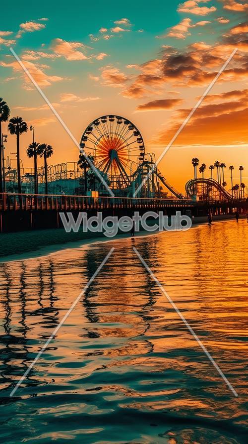 Sunset at the Beach with Ferris Wheel and Palm Trees