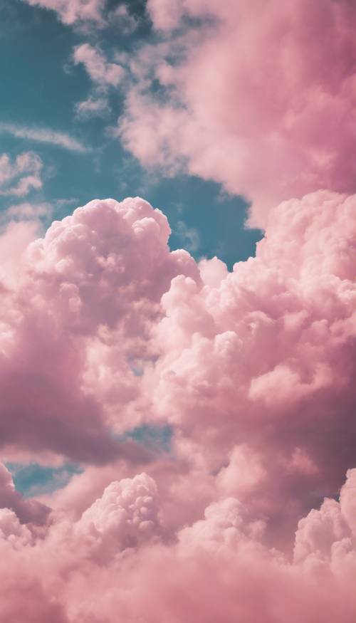 A dreamy sky filled with whimsical pink and blue clouds.
