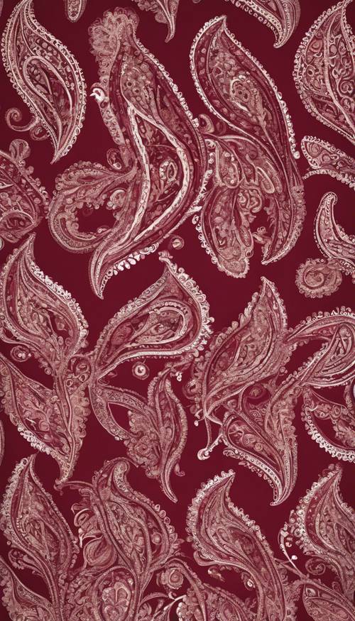 Vintage tarzı ipek bir eşarbı mükemmel bir şekilde süsleyecek zengin bordo paisley deseni.