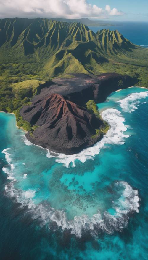 An aerial shot of a Hawaiian volcanic island surrounded by turquoise-colored ocean.
