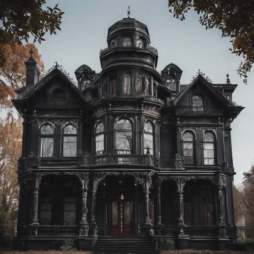 The exterior facade of a black Victorian era Gothic mansion