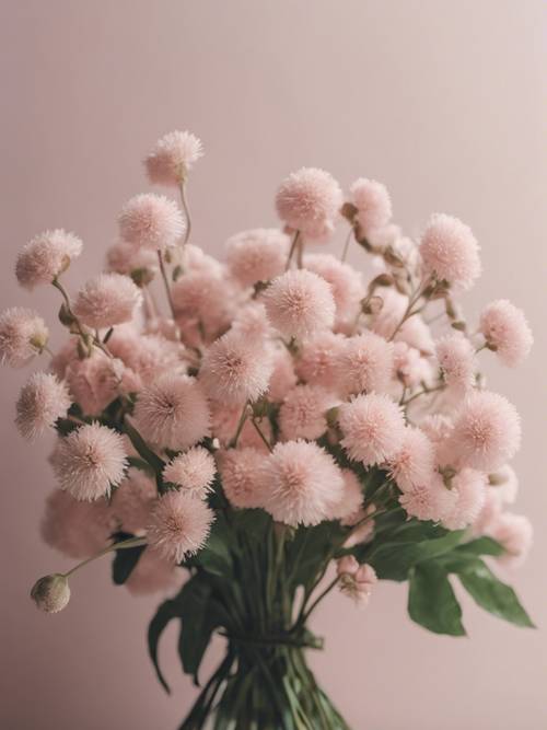 一束柔和的粉紅色花朵的簡約花束