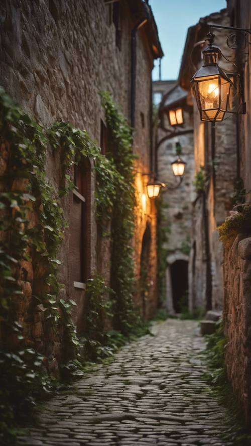 A quaint European cobblestone alleyway lined with medieval stone houses and climbing ivy, illuminated by warm lamp lights.