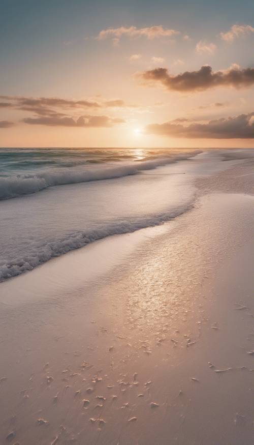 صورة لشاطئ أبيض عند الفجر، عندما بدأت السماء تحمر مع أول أشعة الشمس.