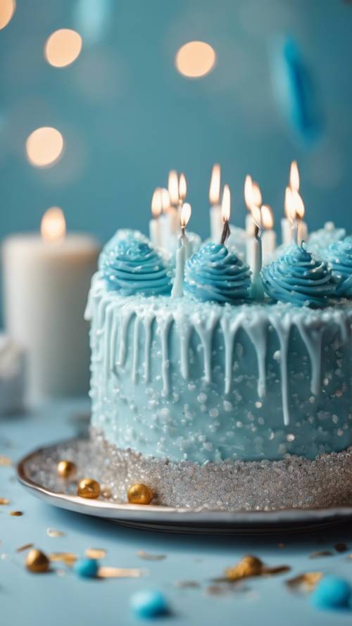 A close-up shot of a birthday cake covered in light blue icing with silver sparkles.