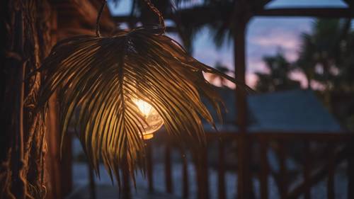 A glowing palm leaf acting as a rustic lamp in a treehouse at dusk.