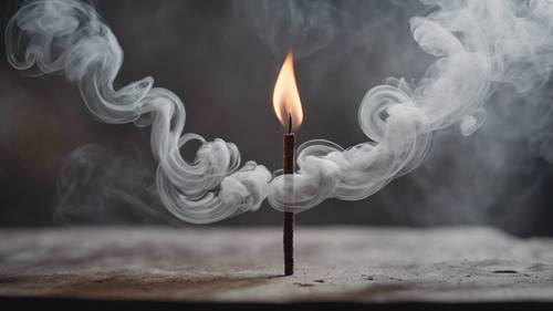 Um bastão de incenso que emite plumas espirais de fumaça cinzenta e perfumada.