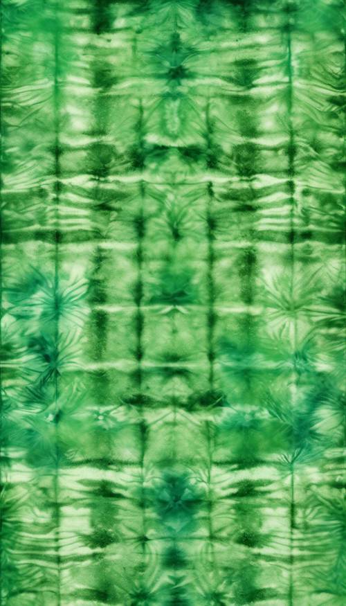 Uma coleção de diferentes tons de verde em um padrão tie-dye.