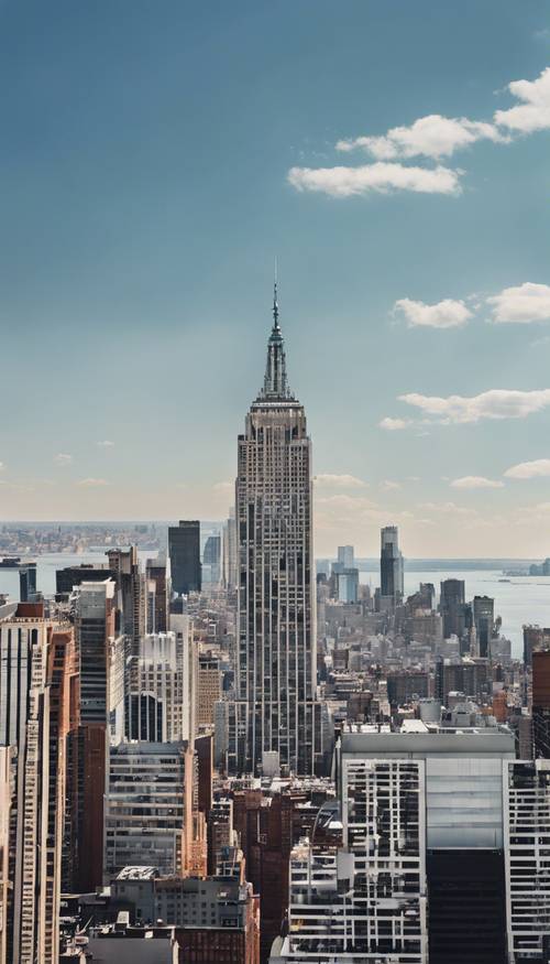 以美丽的淡蓝色天空为背景的纽约市天际线景观。