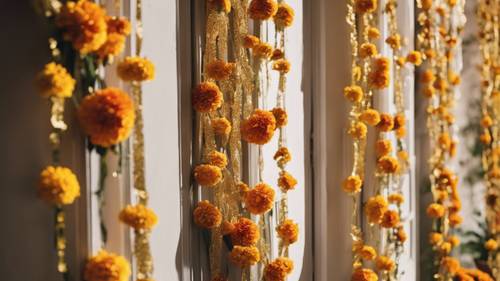 A garland of gold marigolds hanging gracefully from a doorway during a festive ceremony.