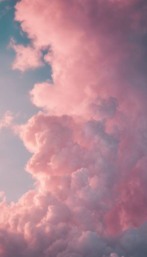 Cotton candy like pastel clouds gently floating in the early evening sky. Tapeta [196d55661a074410a3d9]