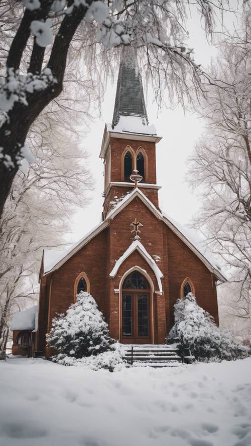 A quaint little small-town church covered in snow