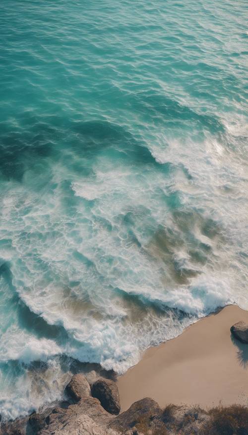 청록색의 미학을 구현하는 한낮의 잔잔한 바다.