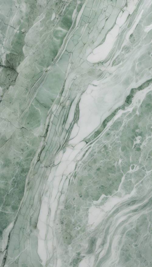 Una losa pulida de mármol verde salvia con vetas blancas y gris claro, bajo una suave luz blanca.