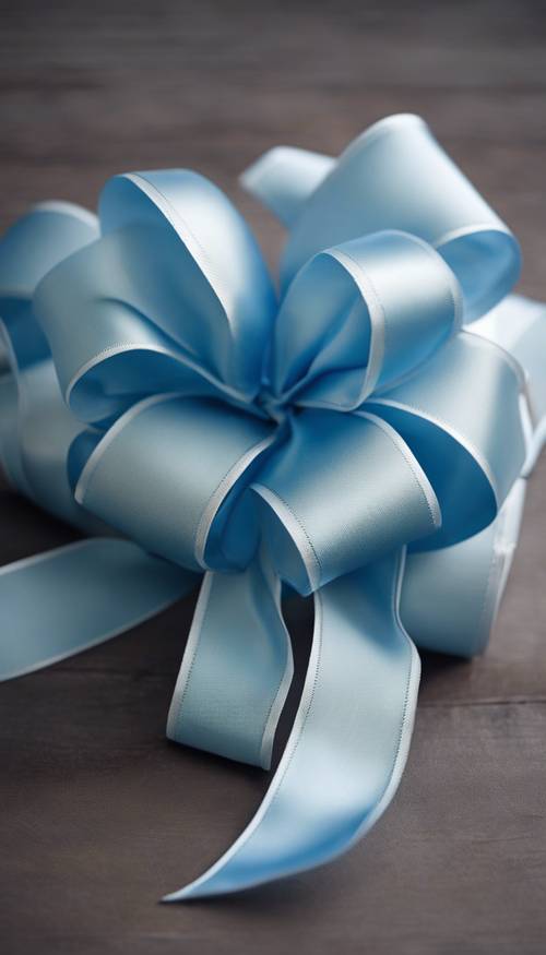 A close view of a light blue silk gift ribbon tied in a perfect bow.