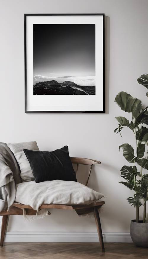 Black framed minimalist artwork hanging on a white wall