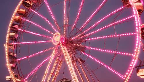 A silver ferris wheel glowing with pink lights at a carnival at dusk.