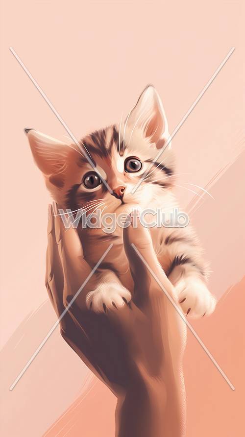 かわいい子猫が抱かれている壁紙 - 画面の背景にぴったり