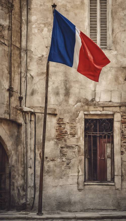 An antique grunge style French flag flying against the backdrop of an old bulwark.