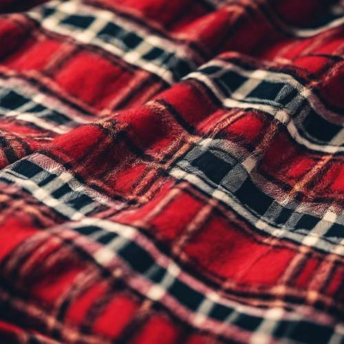 A classic red tartan pattern on a warm woolen scarf.