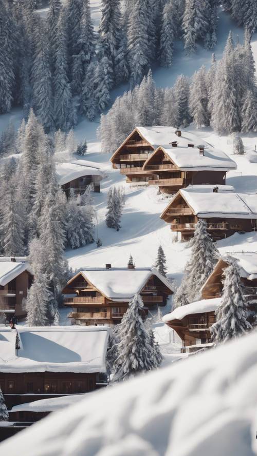 Một gia đình trượt ván tuyết đang uốn mình xuống những con dốc rộng, mời gọi trên nền ngôi nhà gỗ hình hộp sô cô la.