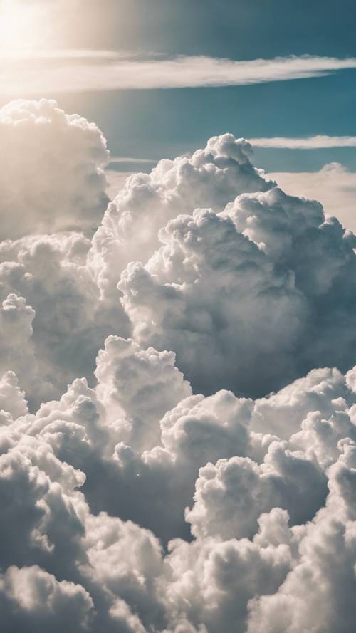 A skyscape filled with puffy white cumulus clouds. Тапет [687643ff937a433abbc2]