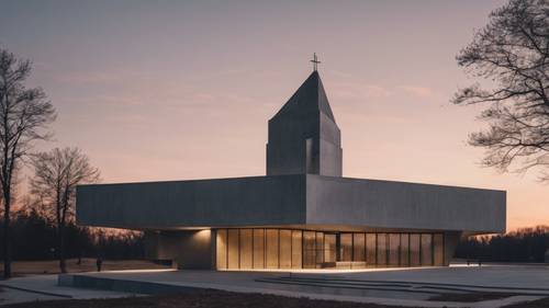 A modern concrete church with minimalist design at dusk