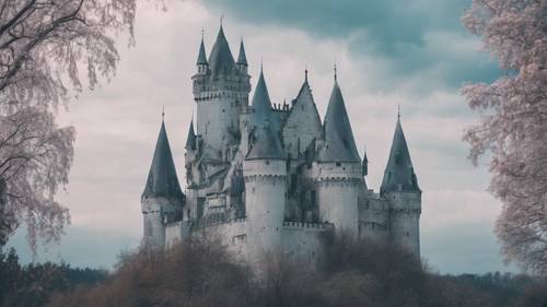 A gothic castle painted in shades of pastel blue under a gloomy sky.