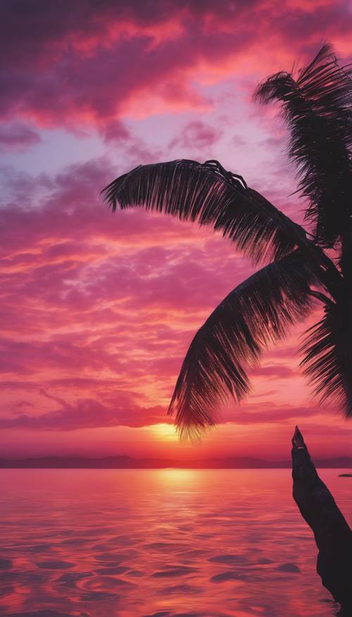 Matahari terbenam tropis berwarna merah muda dan oranye cerah, terpantul di lautan jernih.