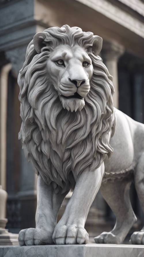 An intricately carved statue of a lion done in a smooth gray marble.