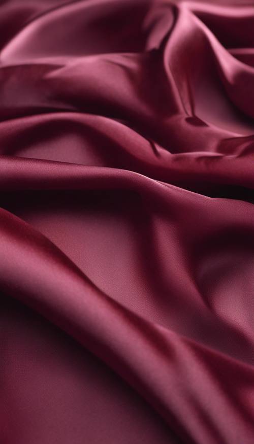 A bold, seamless pattern of burgundy silk fabric floating in the wind.