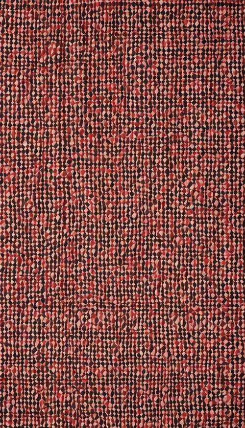 Geometric red and black pattern on an elegant silk fabric