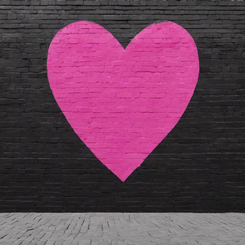 A big pink heart painted on a black brick wall.