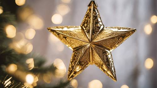Ornamen bintang Natal metalik emas yang dibuat dengan indah.