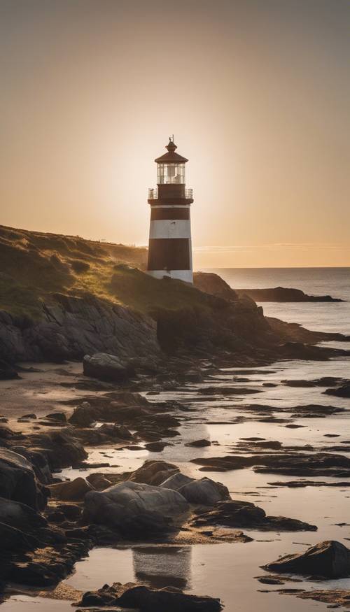 An old lighthouse at first light, casting long shadows over a coastal landscape.