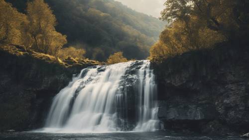 Ein majestätischer Wasserfall mit dem Satz „Schau nicht auf die Uhr. Tu, was sie tut. Mach weiter.“ verstärkt durch das Naturphänomen des unaufhörlich fließenden Wassers.