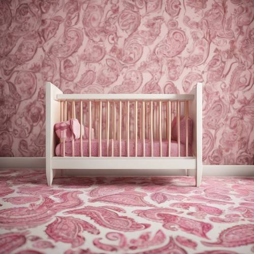 An infant’s nursery decorated with pink paisley patterns.