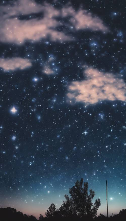 Сумеречное небо, окрашенное оттенками черного и синего, звезды начинают мерцать.