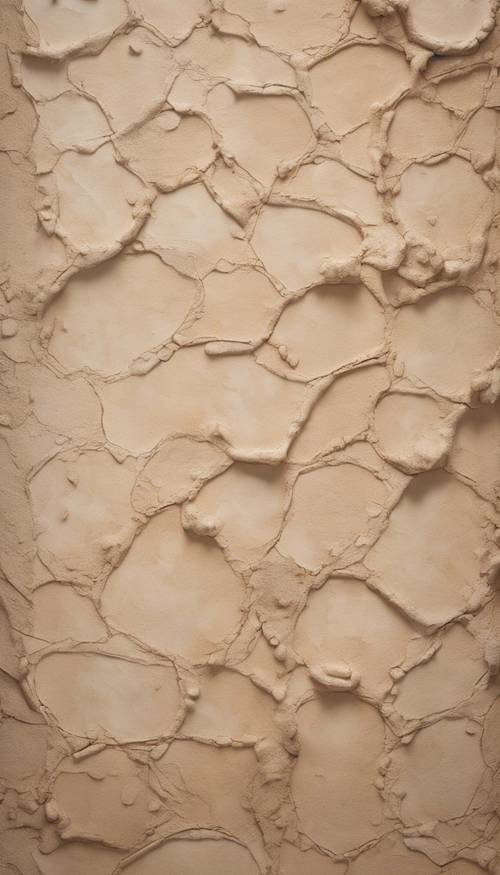 Текстурированная стена, окрашенная в мягкий успокаивающий оттенок коричневого цвета.