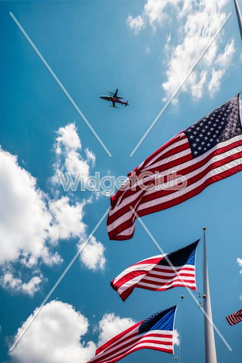Samolot lecący nad amerykańskimi flagami