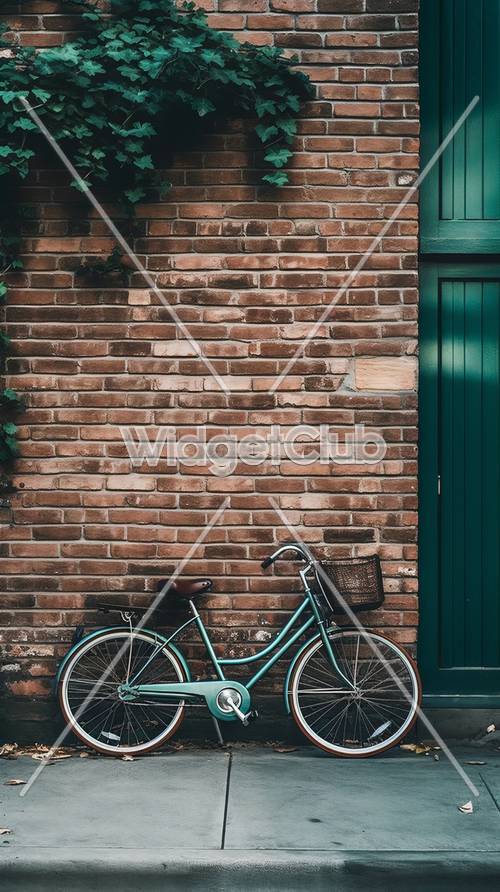 Bicicleta azul vintage cerca de la pared de ladrillo