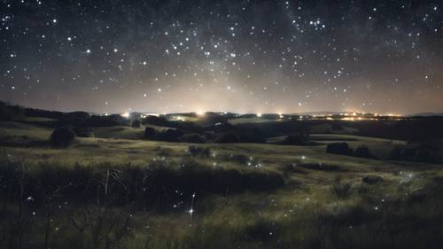 Konstelasi Capricorn berkilauan terang di langit malam bertabur konstelasi tinta di lanskap pedesaan terpencil.