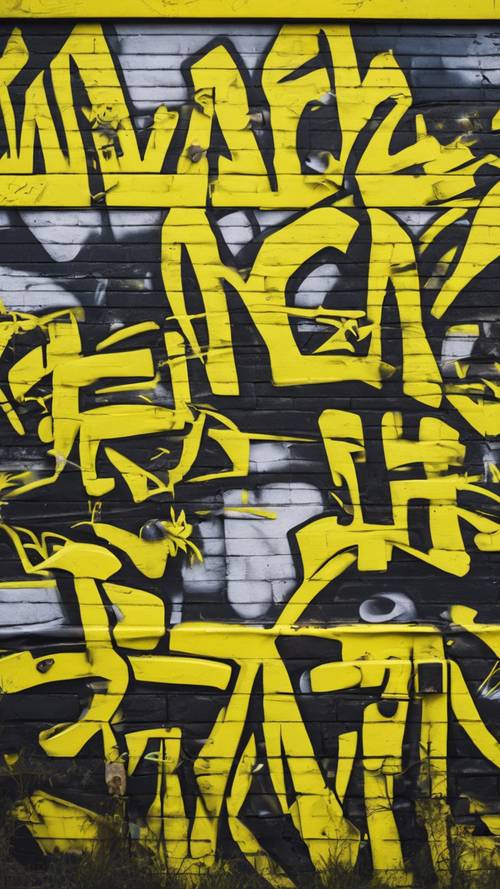 Una pared de graffiti urbano que consta de gráficos salvajes de color amarillo neón.